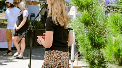 Young musician performing at the markets
