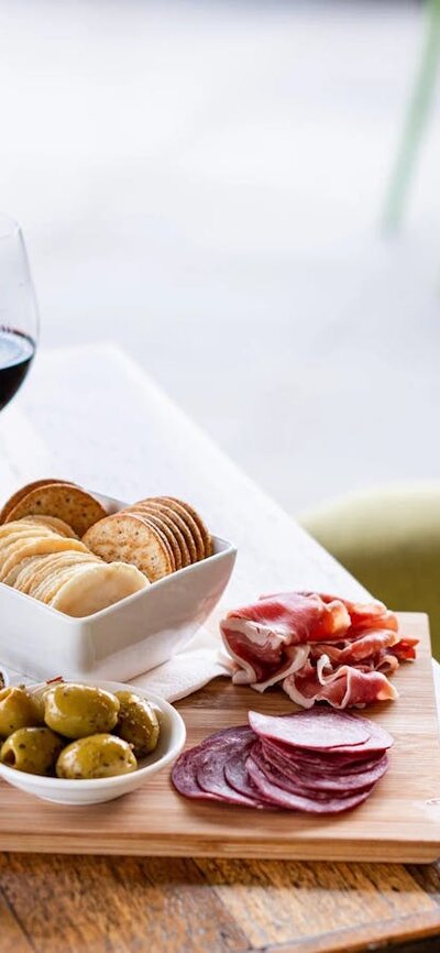 grazing platter and red wine on a table from Shaw Estate Wines Canberra