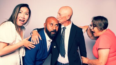 Wedding Ring, suffeRing 2 women and 2 men playing. Women looking shocked as men are kissing each other