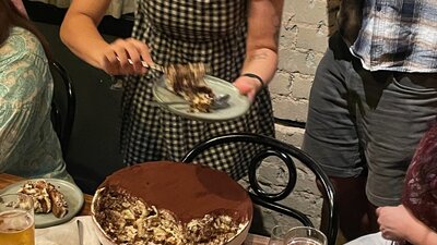 Distiller's Dinner 2025 Serving Tiramisu during Distiller's Dinner 2025