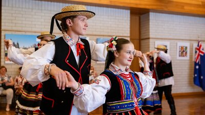 Two people dancing in traditional dress