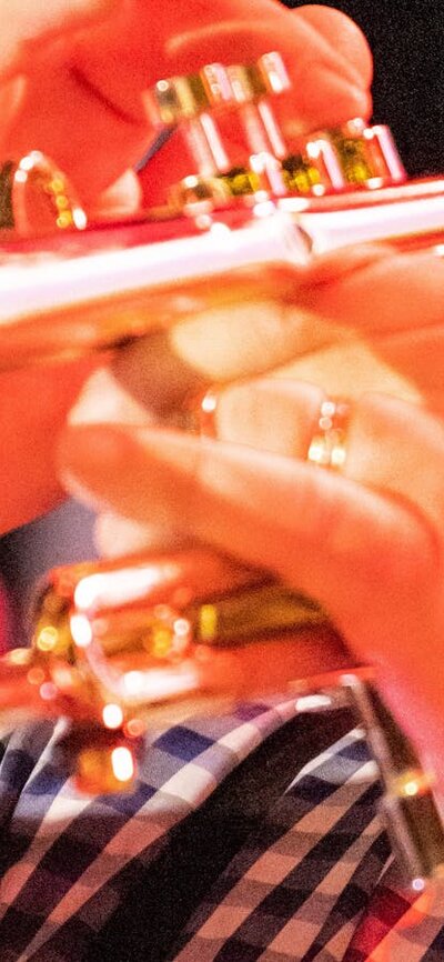 Trumpet player playing world music.
