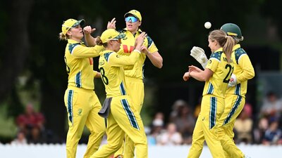 The Australian Women's Cricket Team celebrates a wicket in a One-Day International Match