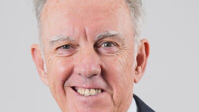 Gerard Callinan A smiling man with gray hair.