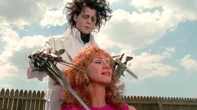 Edward Scissorhands (1990) Man cutting womans hair with large scissors for hands
