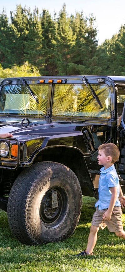 The Hummer - one of the vehicles you can choose for our Wild Night ZooVenture Tours Family and zoo guide with a Hummer, a vehicle used for night tours within the national zoo